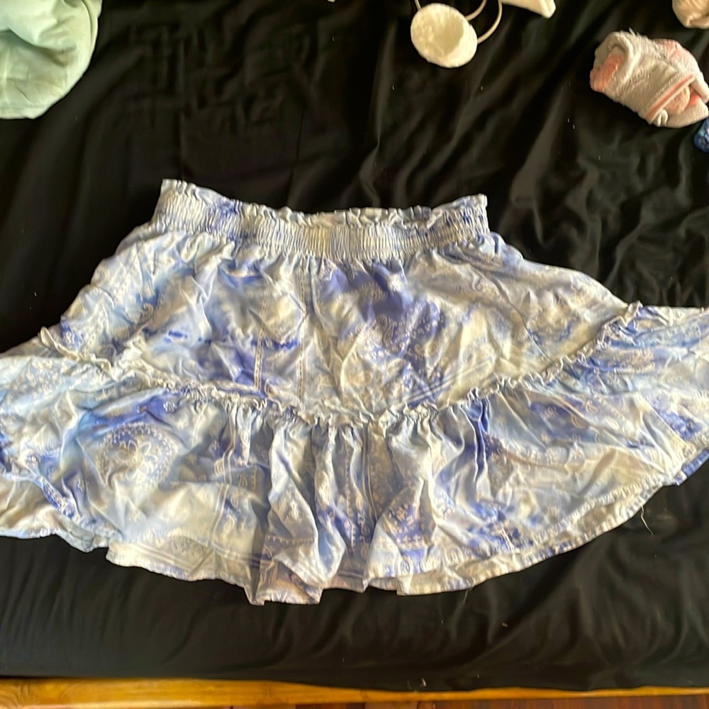 This is a blue and white skirt. It is in size large